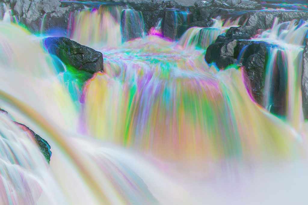 Waterfall transformed with Harris Shutter Effect, blending vibrant colors into flowing motion -- an impressionistic meditation on time and resilience.